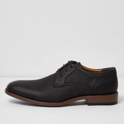 Black embossed formal shoes